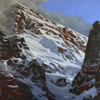 behind the shadowy peaks