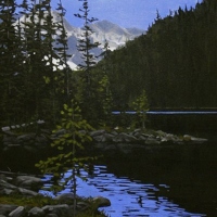 mountain glow behind the lake